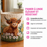Alice™ | Panier rembourré avec vache Highland parmi des fleurs