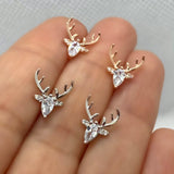 Boucles d'Oreilles en Corne avec Zircon Transparent