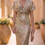 Robe midi effet sculptant avec nœud central et tombé fluide