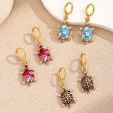 Boucles d'oreilles Huggie Tortue de Mer Charme Océan