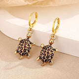 Boucles d'oreilles Huggie Tortue de Mer Charme Océan
