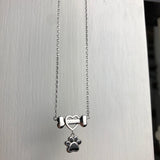Collier en Acier Inoxydable avec Pattes de Chien Élégantes