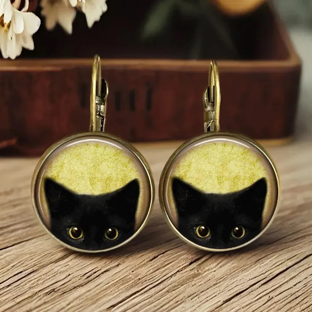 Boucles d'oreilles en verre sous dôme avec animaux fantaisistes