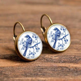 Boucles d'oreilles en dôme de verre vintage avec pie bleue