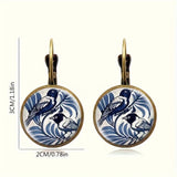 Boucles d'oreilles en dôme de verre vintage avec pie bleue