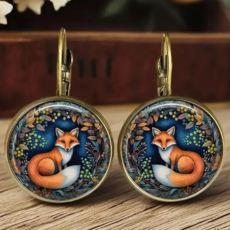 Boucles d'oreilles en verre sous dôme avec animaux fantaisistes
