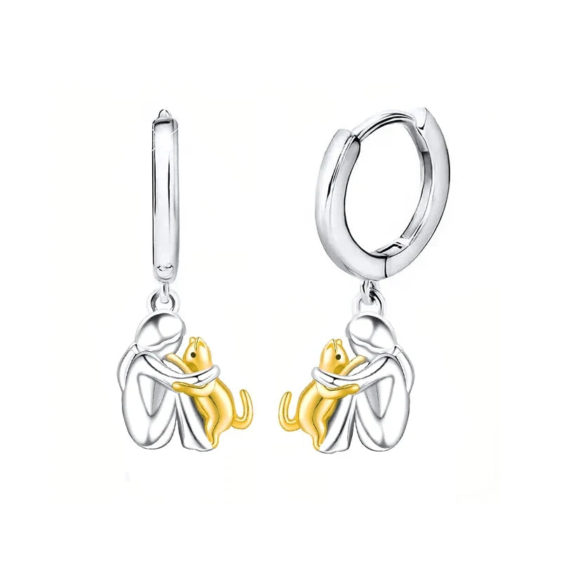 Boucles d'oreilles en argent et or bicolore représentant un câlin de chat