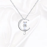 Collier en croissant de pierre de lune et chat